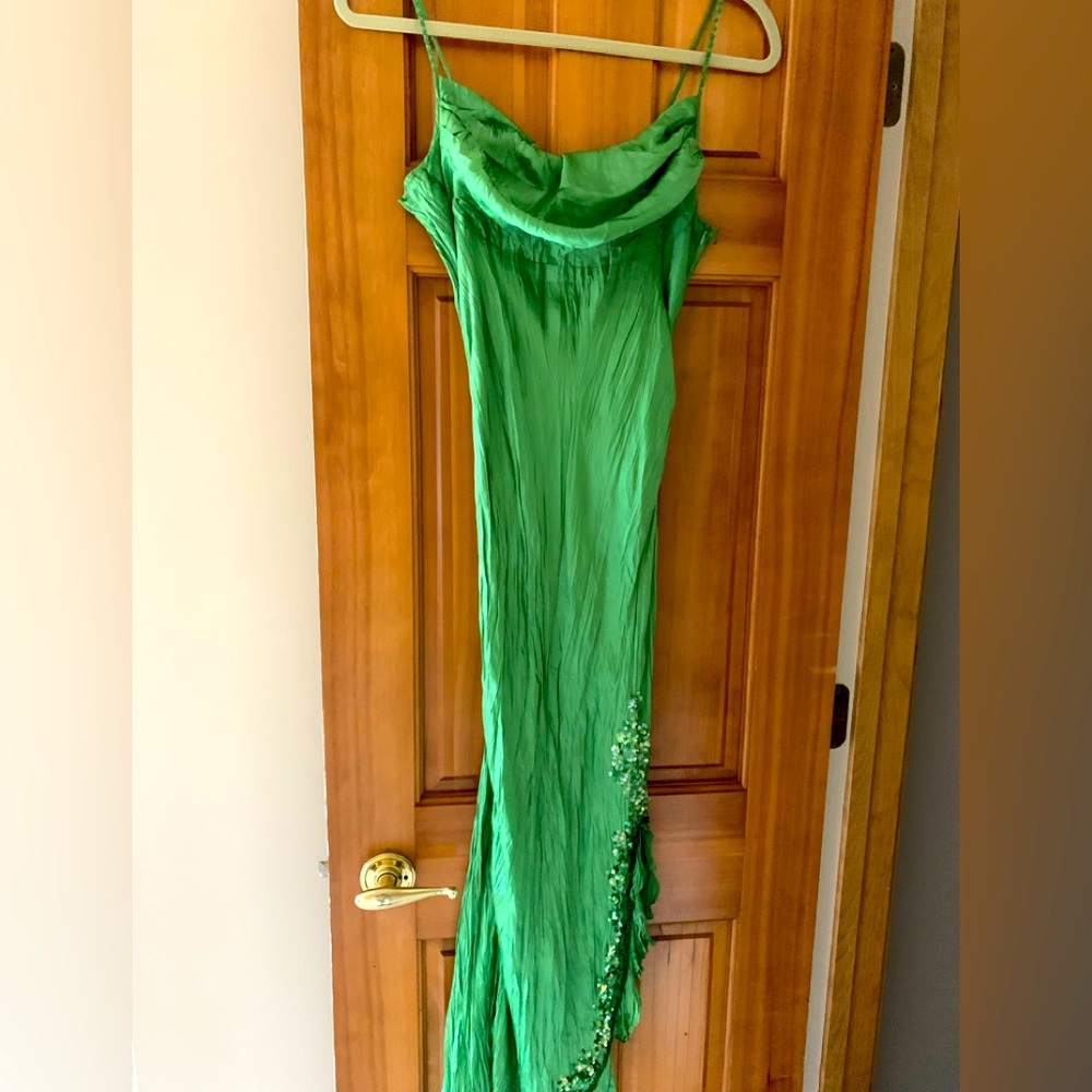 Thin straps bright green midi dress. I am size 4. Brand new.